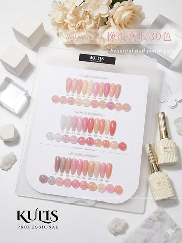 Kulis nail polish color chart with a bottle on a marble surface with flowers.